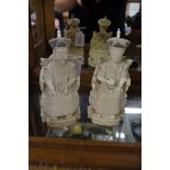 A pair of Chinese carved ivory figures of courtesans, signed to base, 16cm high.