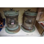 Two old copper masthead lamps.