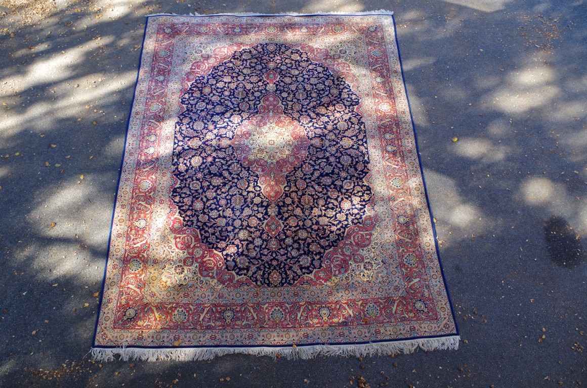 A fine and large Persian rug, having allover floral design on blue and salmon field, 406 x 297cm. - Image 3 of 5