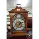 An 18th century style walnut musical bracket type clock, 42cm high.