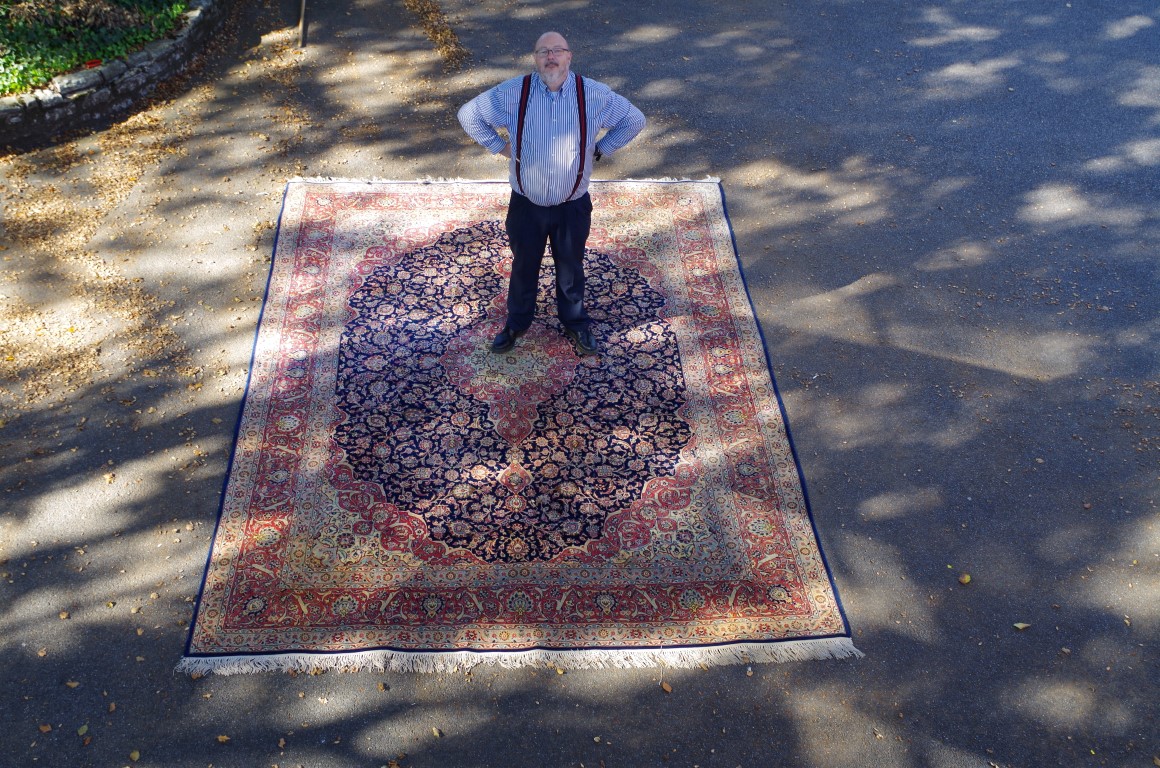 A fine and large Persian rug, having allover floral design on blue and salmon field, 406 x 297cm. - Image 2 of 5