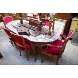 A Louis XV style carved walnut and Breccia marble dining table, 206cm long; together with a set of