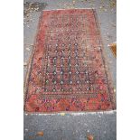 An old Bakhtiari rug, having allover floral design with geometric border, with original purchase