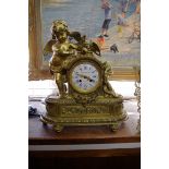 A late 19th century gilt metal mantel clock, the enamel inscribed 'Monbro Fils Anie, Paris', 40cm