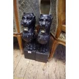 A pair of antique cast iron lion monopodia andirons, 47cm high.