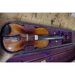 A late 19th century German violin, with 14in back, with bow and rosewood case.