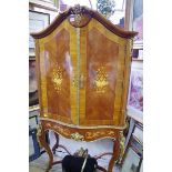 A reproduction, Louis XV style marquetry and gilt brass mounted drinks cabinet, 97.5cm wide.