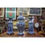 Three Dutch Delft blue and white vases, largest 37cm high.