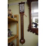 A Victorian oak 'Farmer's Barometer', by Negretti & Zanbra.