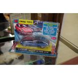 A Corgi Toys 4.2 Litre Jaguar E Type, No.335, in carded blister pack.