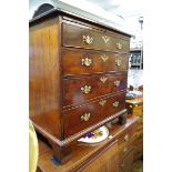 A George III small mahogany chest of four long graduated drawers, with a brushing slide, 82cm wide.