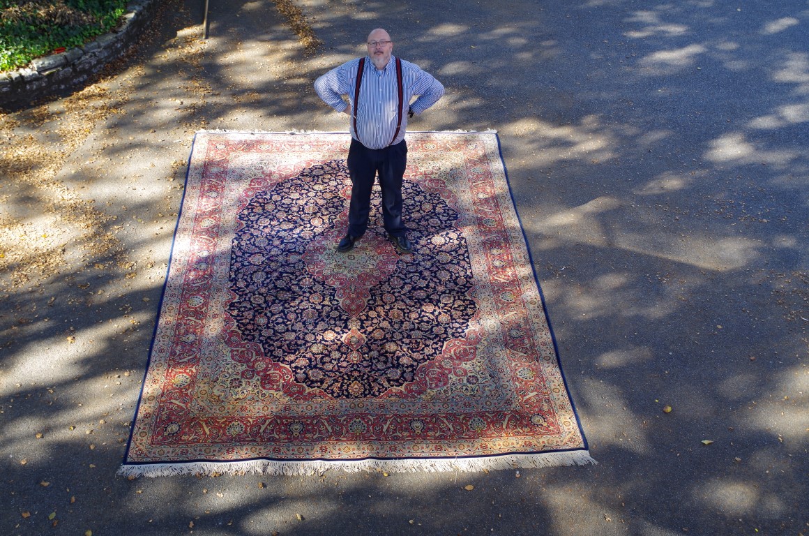 A fine and large Persian rug, having allover floral design on blue and salmon field, 406 x 297cm. - Image 5 of 5