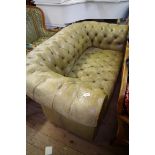 A buttoned green leather Chesterfield settee, 174cm wide.