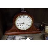 A reproduction mahogany mantel clock, by Comitti, 34cm wide.