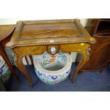 A Louis XVI style walnut and inlaid jardiniere, 74cm wide.