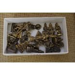 A collection of nineteen Sino-Tibetan small metal figures, largest 5cm high.