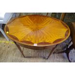 A late Victorian satin wood and inlaid oval occasional table, 81.5cm wide.