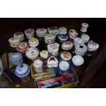A collection of porcelain boxes.