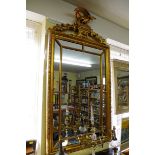 A gilt framed wall mirror, 130x 70cm.