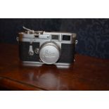 Cameras: a Leica M3, circa 1955, No.748214; with Leitz Summaron f=3.5cm 1:3.5 lens, circa 1954, Nr.