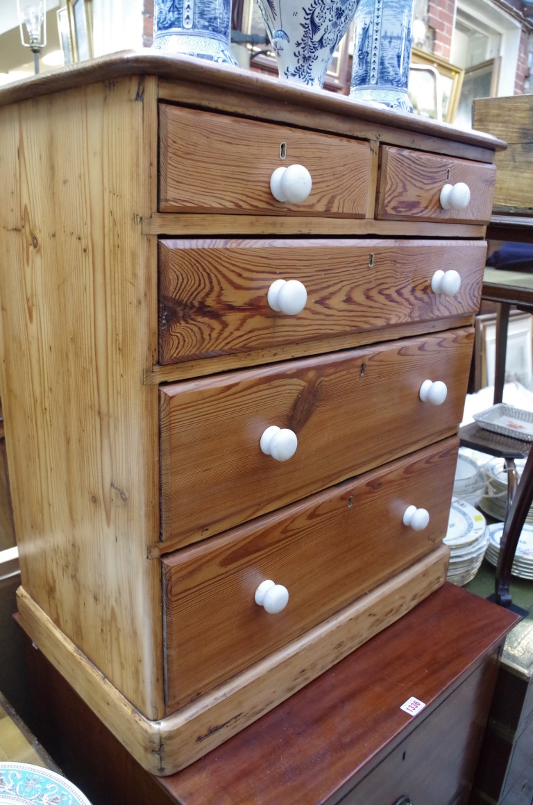 An unusually small 19th century pitch pine chest of drawers, 68cm wide.