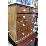 An unusually small 19th century pitch pine chest of drawers, 68cm wide.