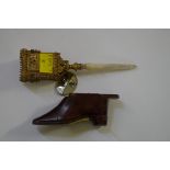 A 19th century novelty treen shoe snuffbox, 9.5cm long; with another item.