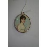 English School, early 19th century, bust length portrait miniature of a young lady, with plaited