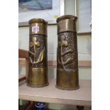 A pair of trench art brass vases, 29cm high.