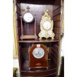 Three old mantel clocks.