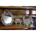 Two Continental porcelain framed easel back mirrors, largest 30cm high; together with another