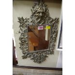 A Victorian cast brass framed wall mirror, 43cm high.