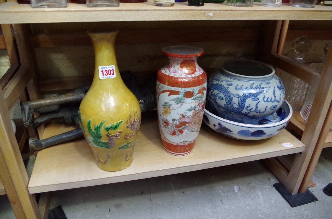 A Chinese sancai vase, Kangxi six character mark, moulded in relief with a phoenix and a dragon,