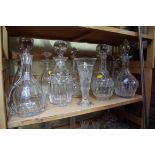 A collection of clear glass decanters and similar, to include examples by Waterford; Thomas Webb;