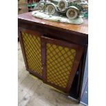 A 19th century mahogany side cabinet, with a pair of brass grille doors, 76cm wide.