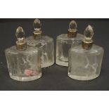 A set of four perfume bottles mounted in silver, by John George Piddington, having import marks