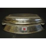 An Art Deco silver serving dish and cover, by Emile Viner, Sheffield 1933, 31.5cm, 930g.