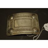 A Celtic design electroplated belt buckle, 9.5cm x 7cm.