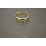 An 18ct gold emerald and diamond ring; together with two 9ct gold rings.