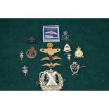 A South African sweetheart brooch; together with other military related badges etc, (14).