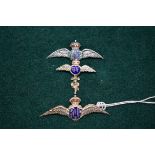 Three silver and enamel RAF sweetheart pins, one having pixie charm attached, largest 53mm, (3).