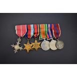 Medals:  a World War II group of five, comprising: OBE; 1939-45 Star; the Burma Star; Defence medal;