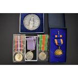 Medals: a Distinguished Flying medal, unnamed; together with a US Air Force Air medal, unnamed, in