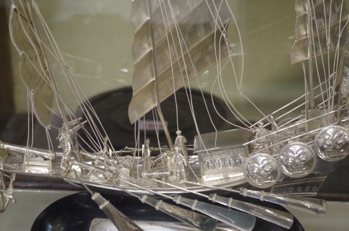 A Chinese silver junk, by Tackhing, with presentation inscription, the hull 25cm long, in a glass - Image 2 of 3