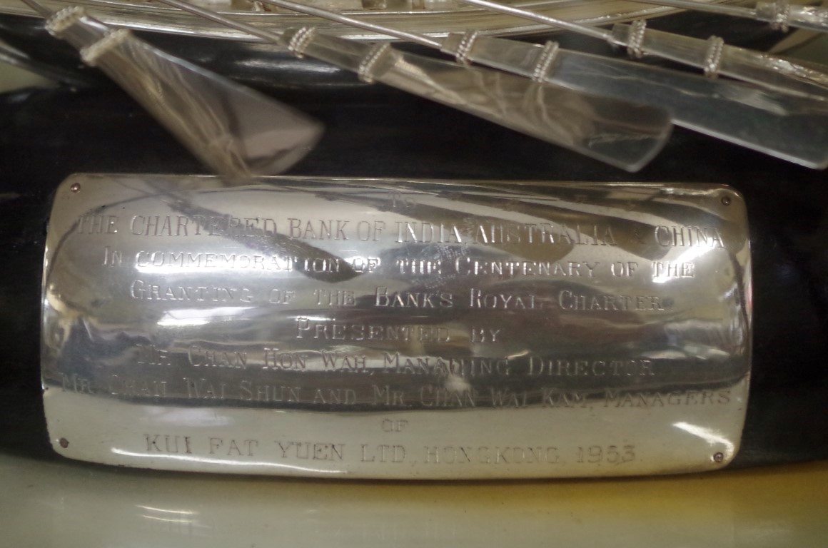 A Chinese silver junk, by Tackhing, with presentation inscription, the hull 25cm long, in a glass - Image 3 of 3