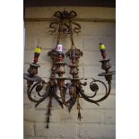 A pair of classical style brass twin branch wall sconces, 53cm high.