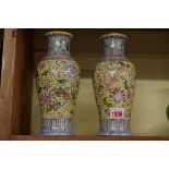 A pair of Chinese yellow ground famille rose vase, Qianlong four character seal mark, 22.5cm