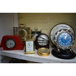 Eight various vintage timepieces, to include a Mappin & Webb brass carriage example; a brown