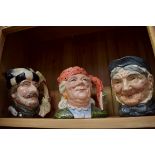 Eight Royal Doulton large character jugs, comprising 'Trapper, D6609'; 'The Fortune Teller,