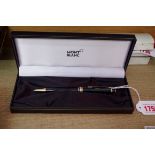 A Mont Blanc Meisterstuck roller ball pen, (engraved with name), boxed.